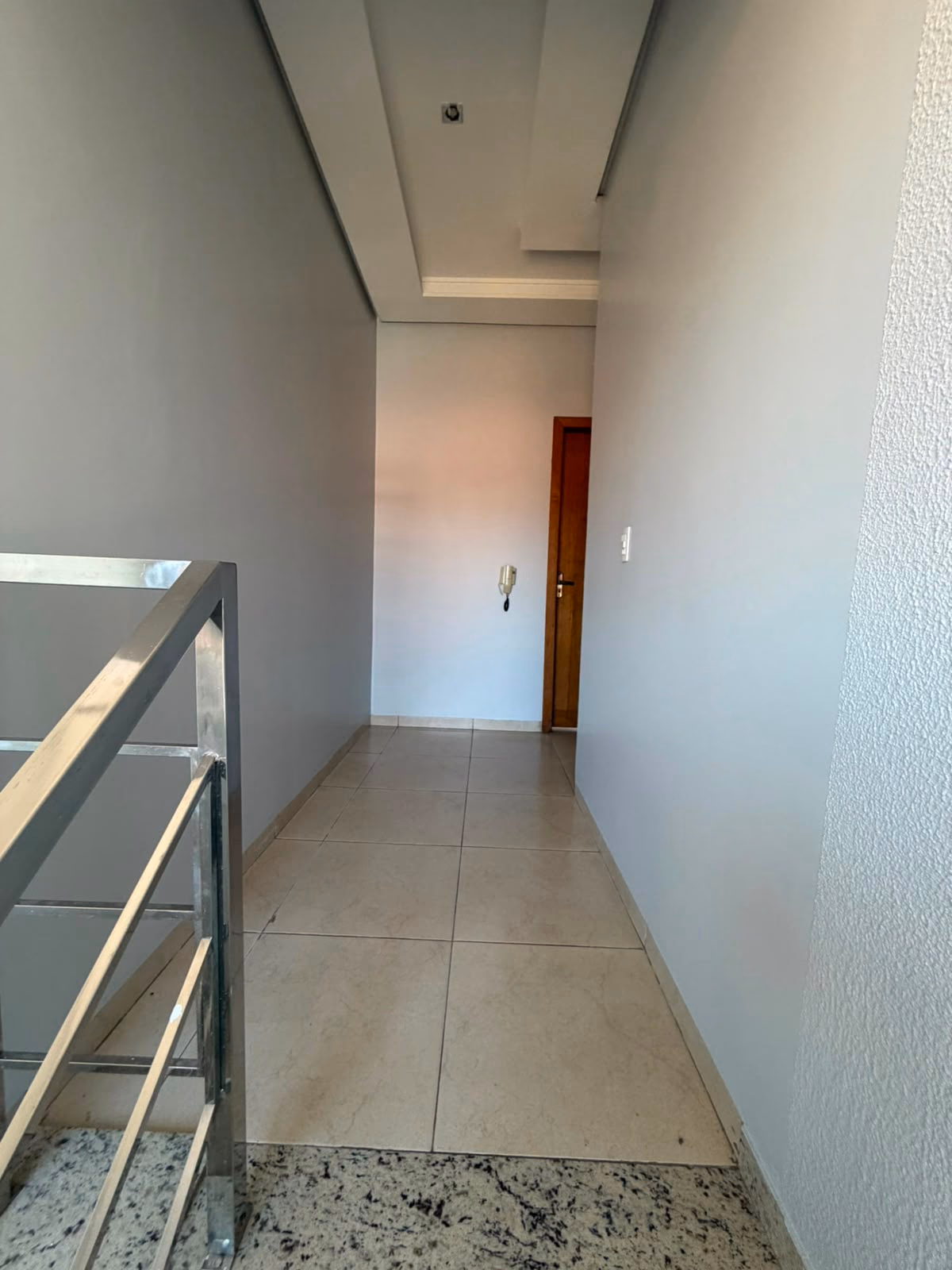 Parte superior da escada e circulação do piso superior